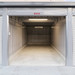 ストレージ王　北区新十日市トランクルーム ガレージ内部は庫内証明を設置しております。