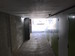シロクマトランク 発寒　バイクガレージ & 貸し倉庫 廊下奥から入口撮影